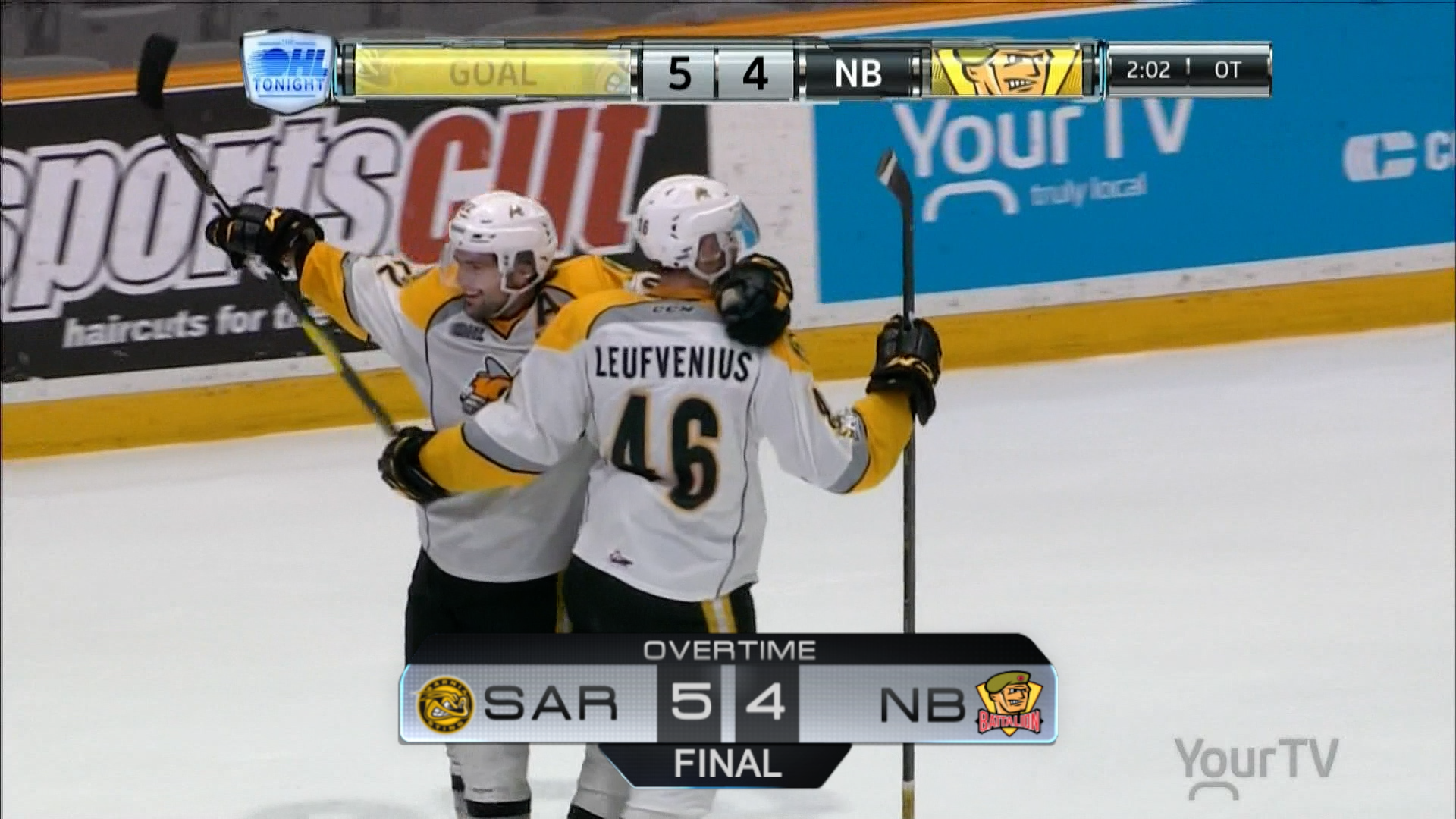 Sarnia celebrating overtime victory over North Bay Battalion