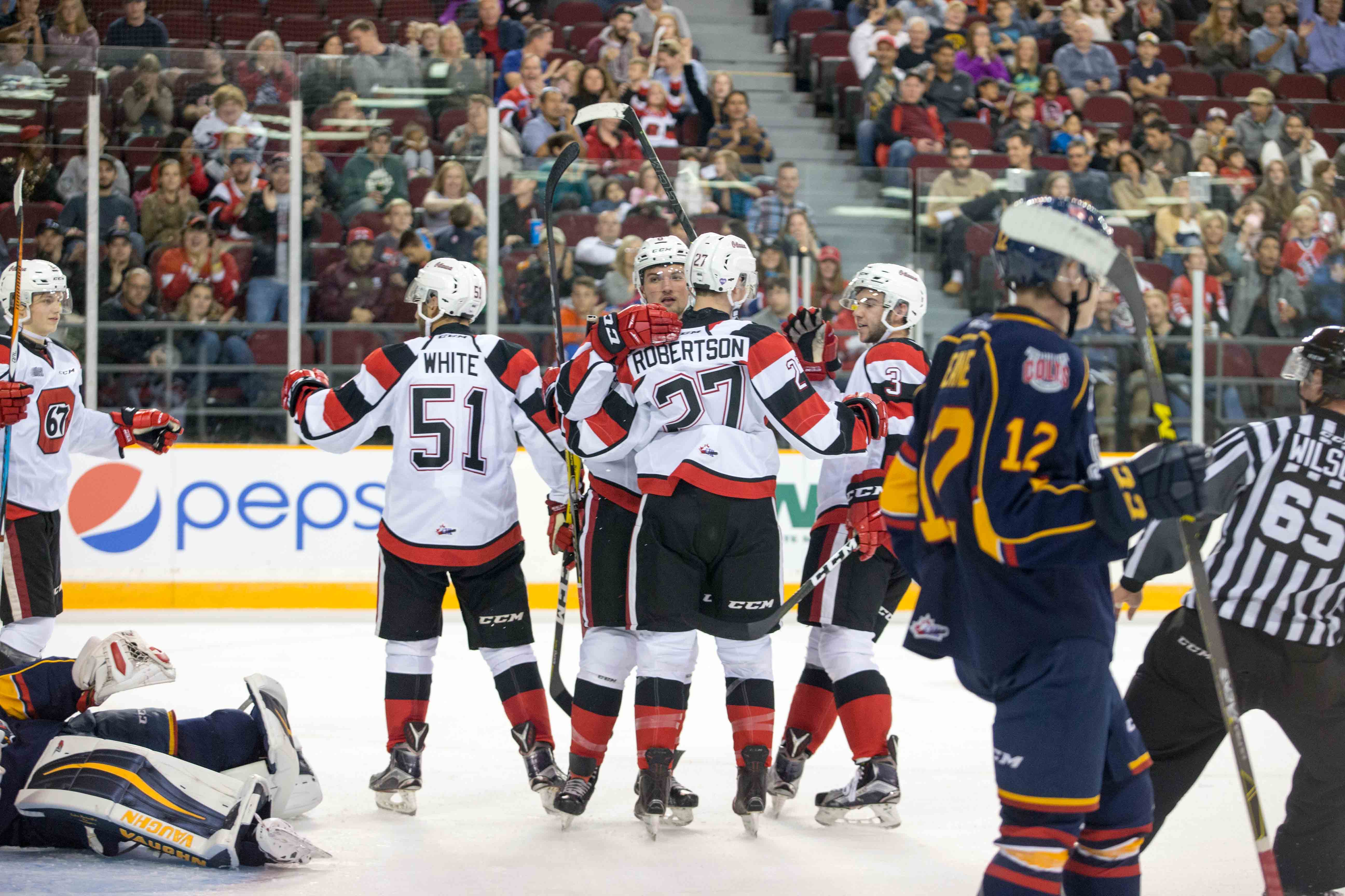 67's celebrate Ben Fanjoy's second period goal in Sunday's home opener at The Arena at TD Place (Photo: Valerie Wutti/Blitzen Photography)