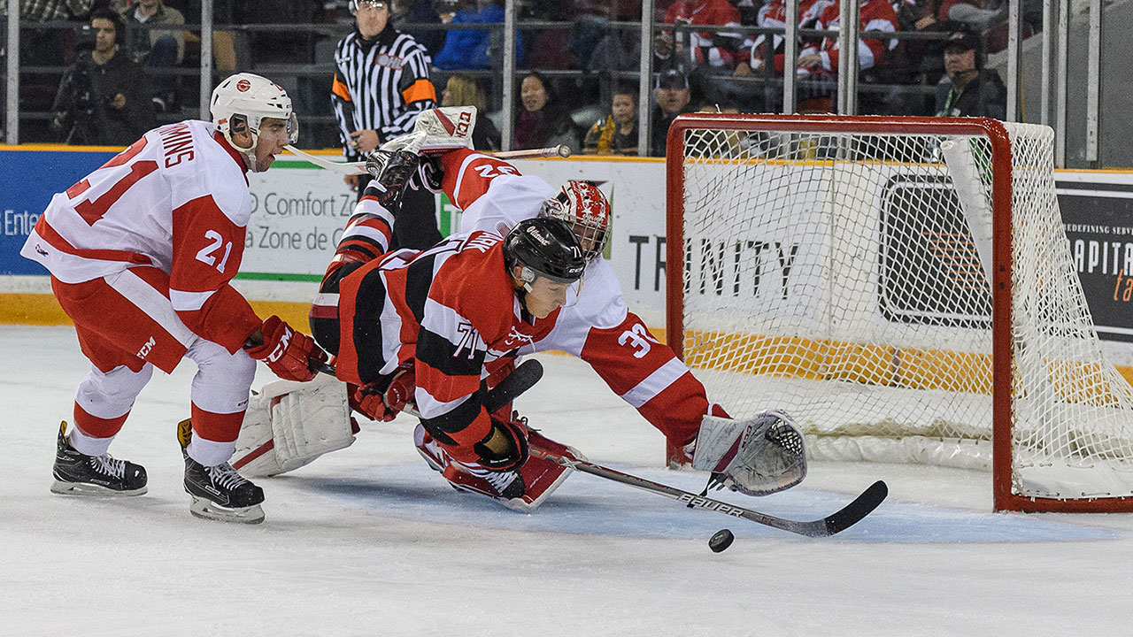 Cody Clark rushing the net