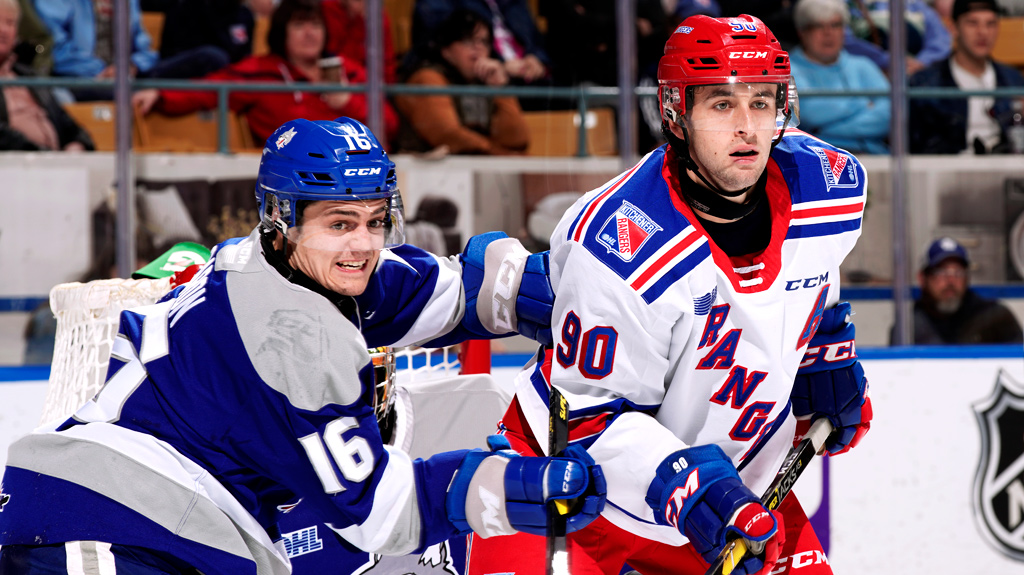 Liam Hawel fighting for position against Sudbury Wolves